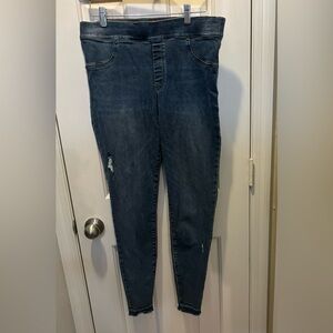 SPANX XL  Blue Jeans with the tear and ragged edged bottom at the cuff stuff